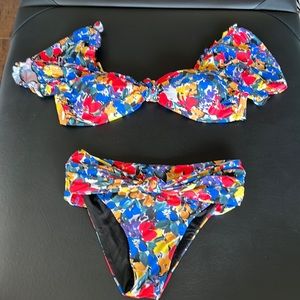 Size S Beach Riot Bikini. Multi color floral pattern.